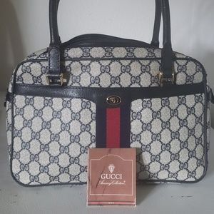 Gucci blue web hand bag.